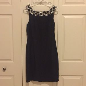 Black cocktail dress with jeweled neckline